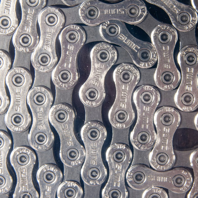 Цепь Sumc - SX10 1/2"x11/128", 10 ск.,116 звеньев, серебристо/серая, с замком SL559R